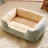 Bed for Cats plush pet bed in light blue with beige soft fleece interior, rectangular shape with cushioned walls