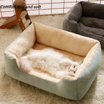 Bed for Cats in light green and beige plush material with soft cushioned sides featuring a white cat comfortably lying inside