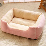 Bed for Cats soft plush pet bed with pink exterior and cream cushioned interior, cozy rectangular shape