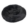 Donut Mand Dog Accessories round pet bed in black plush fabric, with a thick raised cushioned rim and soft center.