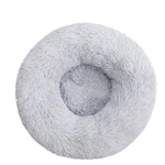 Donut Mand Dog Accessories, a light gray plush pet bed with a round shape, shaggy fabric, and raised cushioned rim